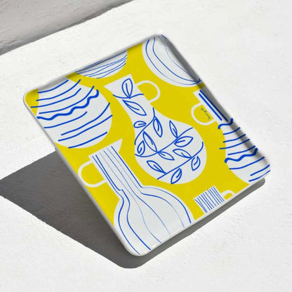 Plateau carré en porcelaine blanche avec motifs